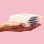 hand holding &SISTERS by Mooncup organic cotton pads