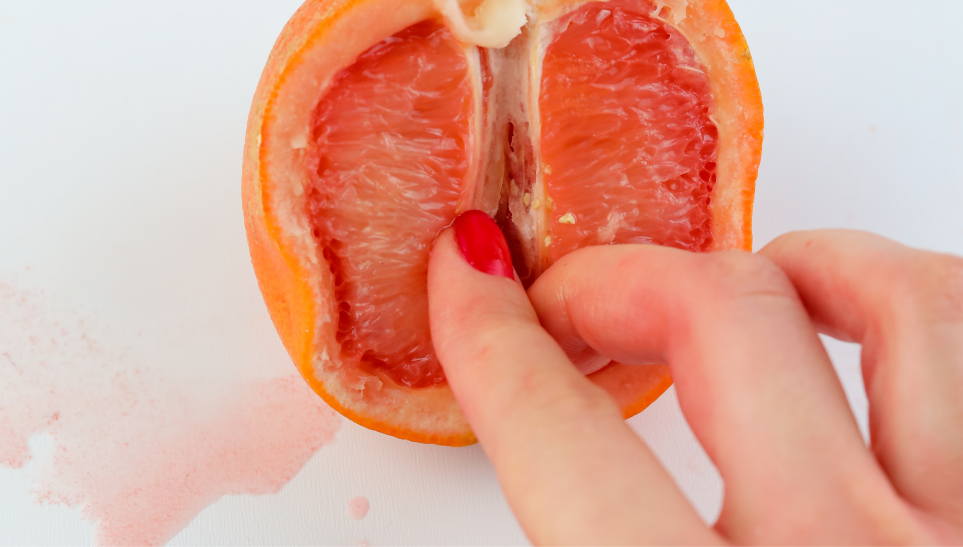 woman touching a fruit representing measuring a cervix