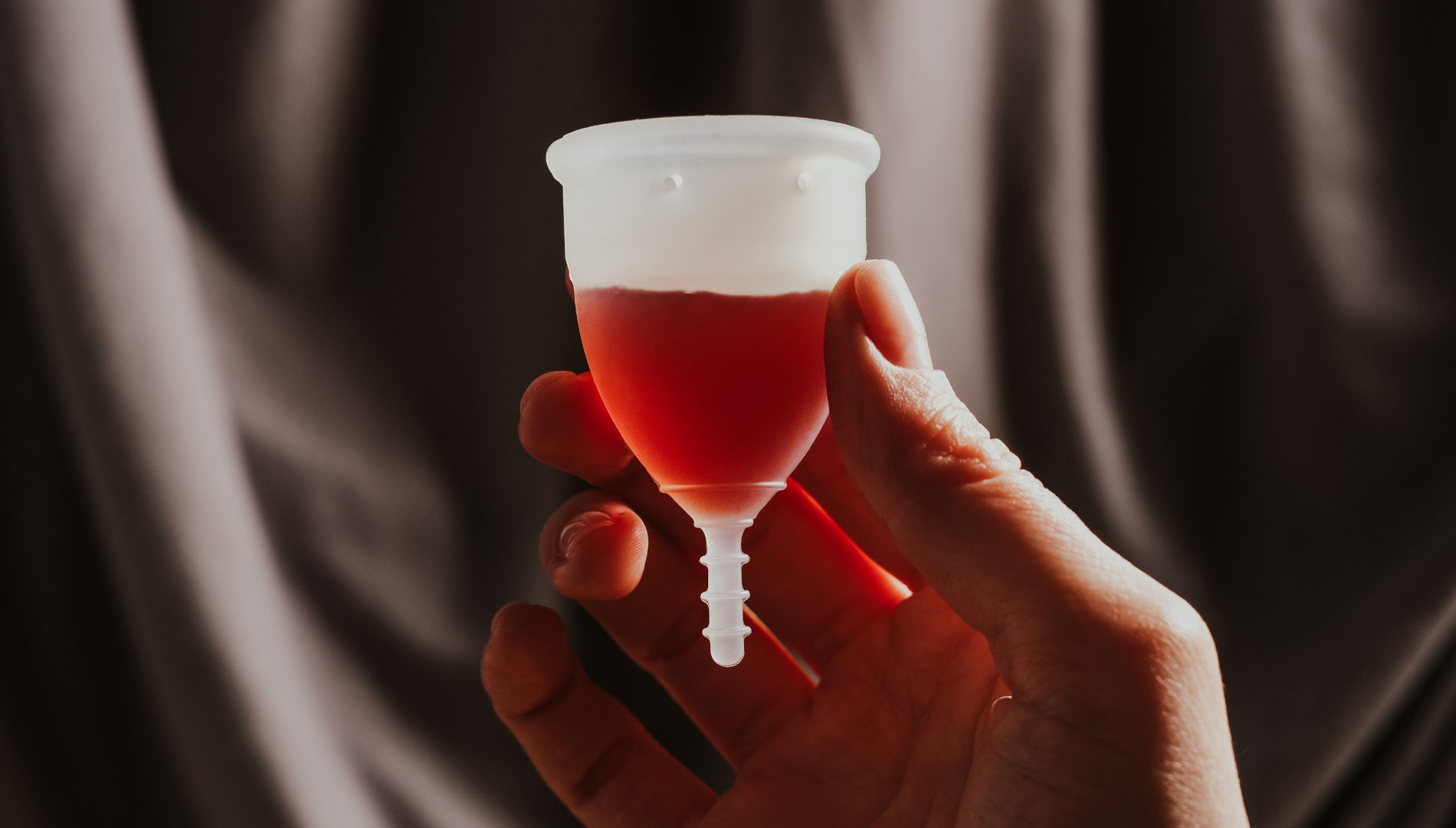 mooncup menstrual cup full of blood