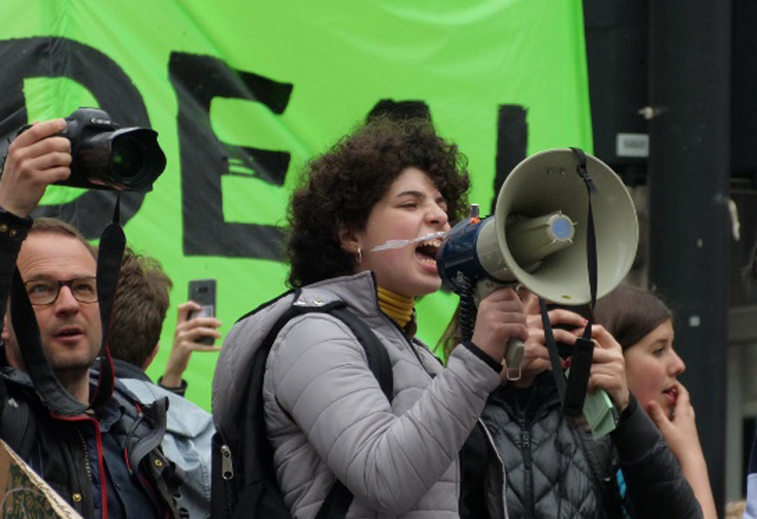 Activist shouting into a microphone.