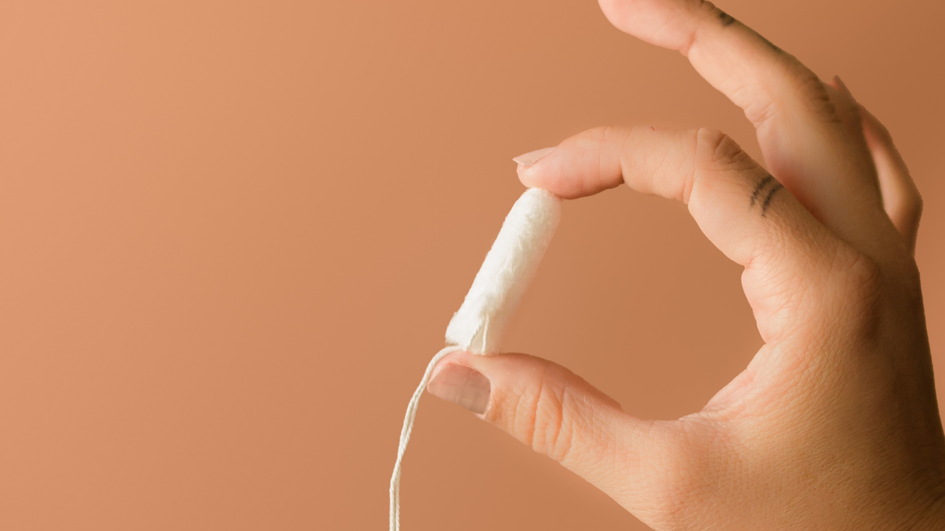 How far should a tampon go in?