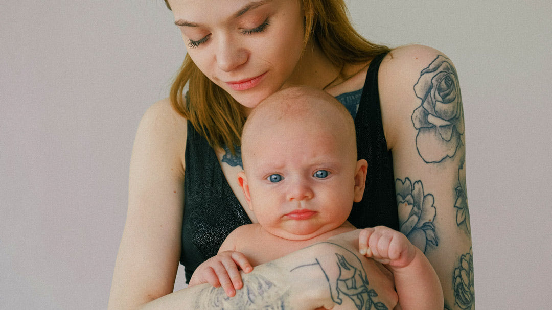 Mother holding her baby.