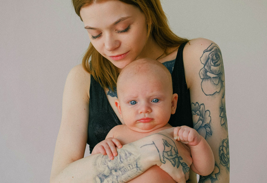 Mother holding her baby.